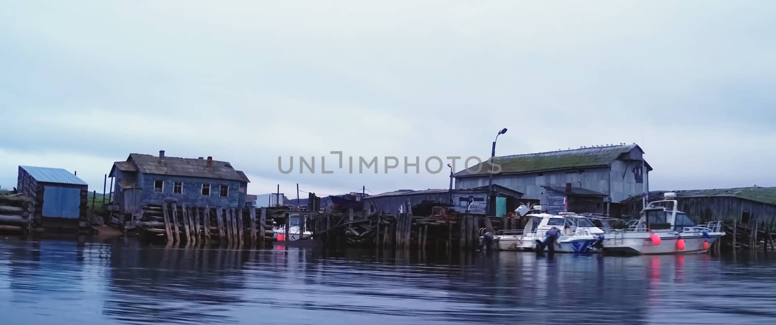 An old wooden pier by the sea.