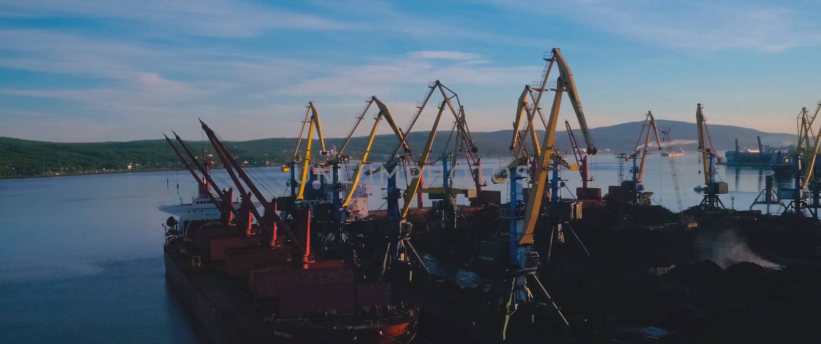 Sea industrial port with port cranes. Sea industrial port with port cranes.