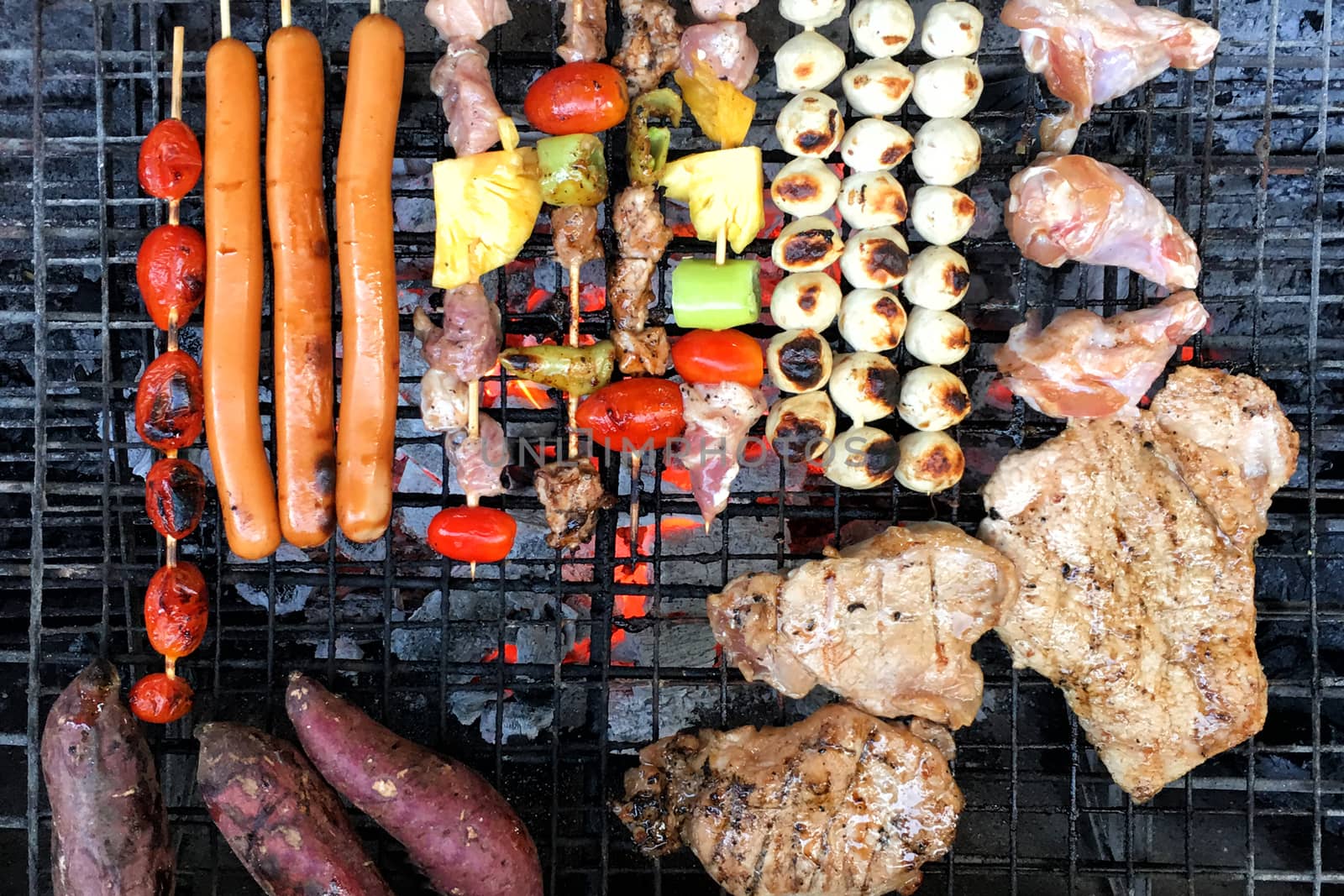 Top view low cost bbq outside cooking by Surasak