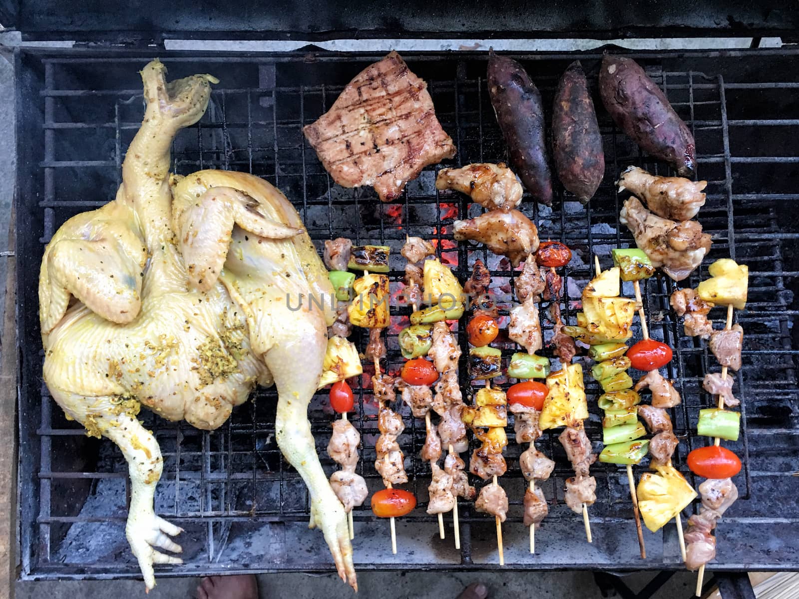 Top view low cost bbq outside cooking by Surasak