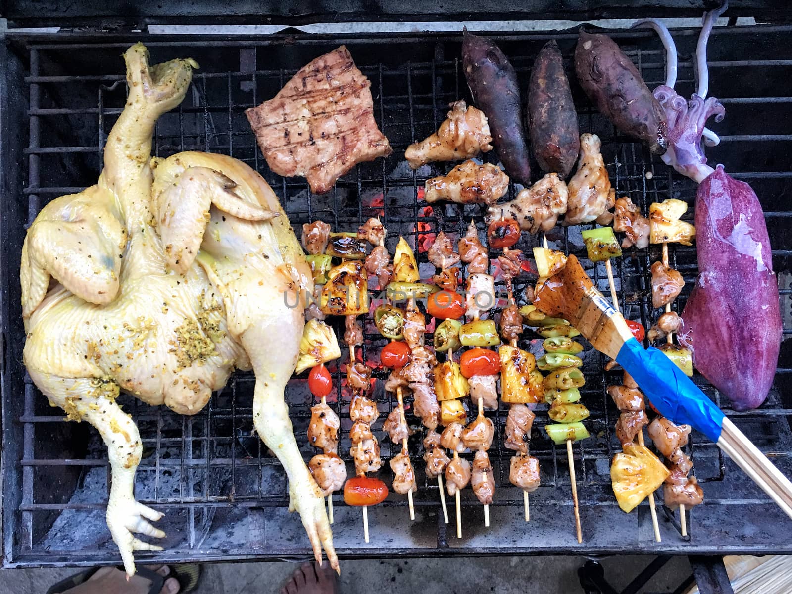 Top view low cost bbq outside cooking by Surasak