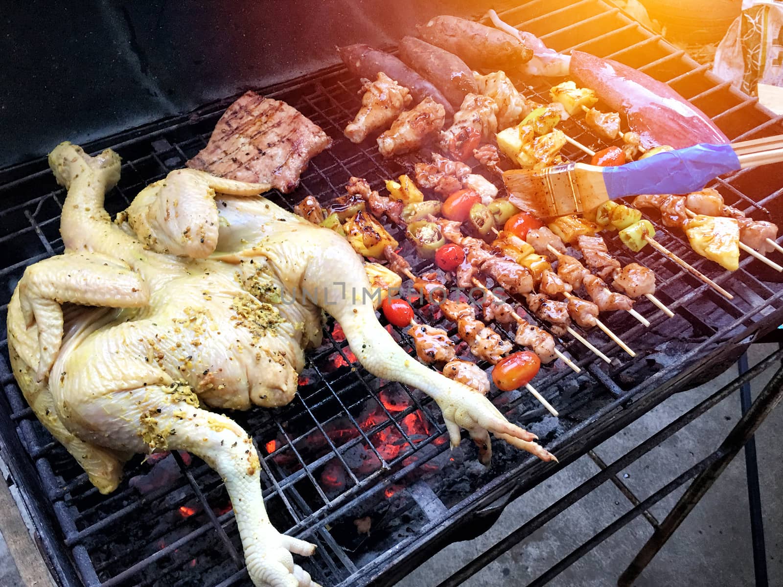 Top view low cost bbq outside cooking by Surasak