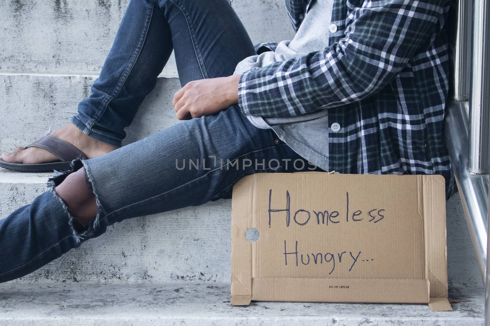 Unhappy homeless man