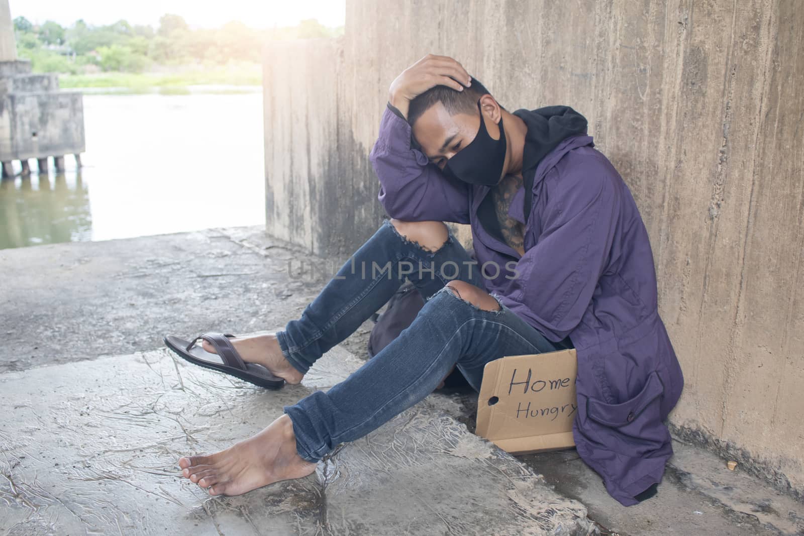 Unhappy homeless man under the bridge by Gobba17