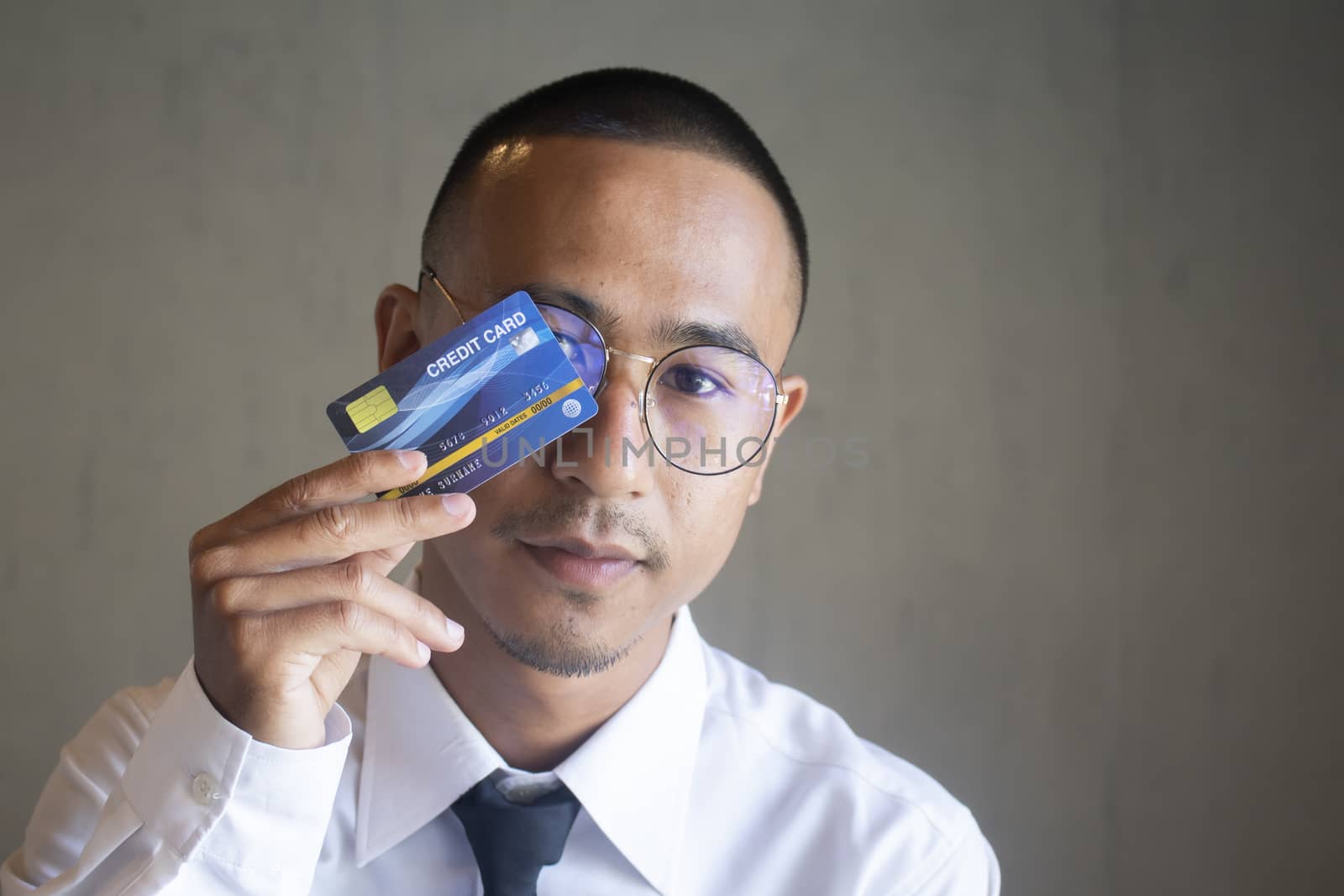 Portrait of business man with cradit card by Gobba17