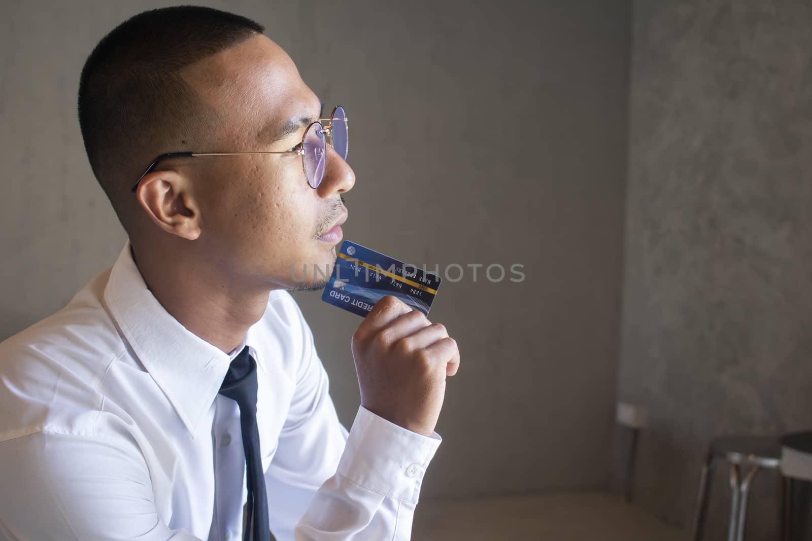 Portrait of business man with cradit card by Gobba17