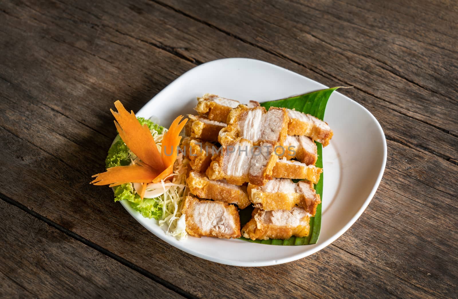 Fried Crispy Pork with Fish Sauce.  Thai food style concept