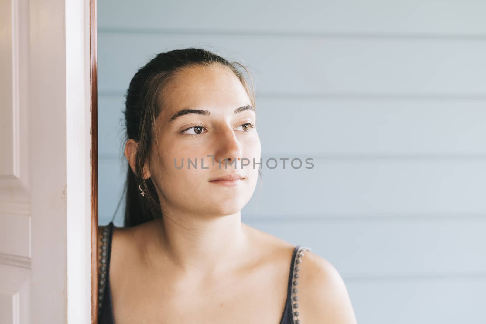 Portrait of a happy young girl in summer dress