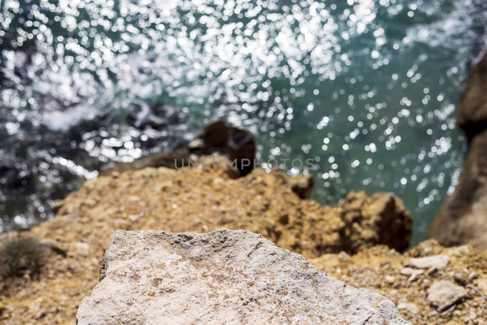Wave breaking against cliff ,view from above