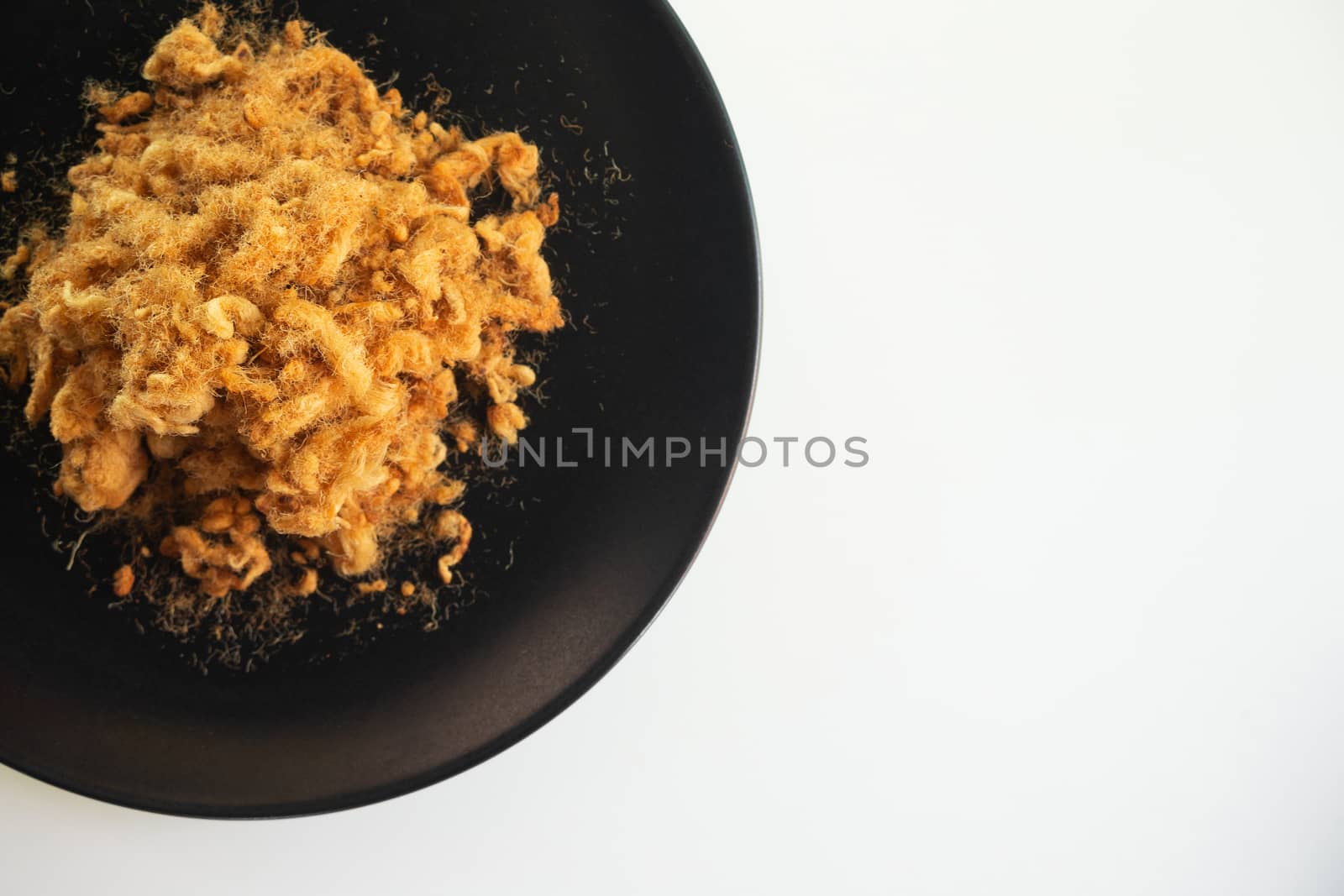 Dried shredded pork on white background, Flossy pork, Top view