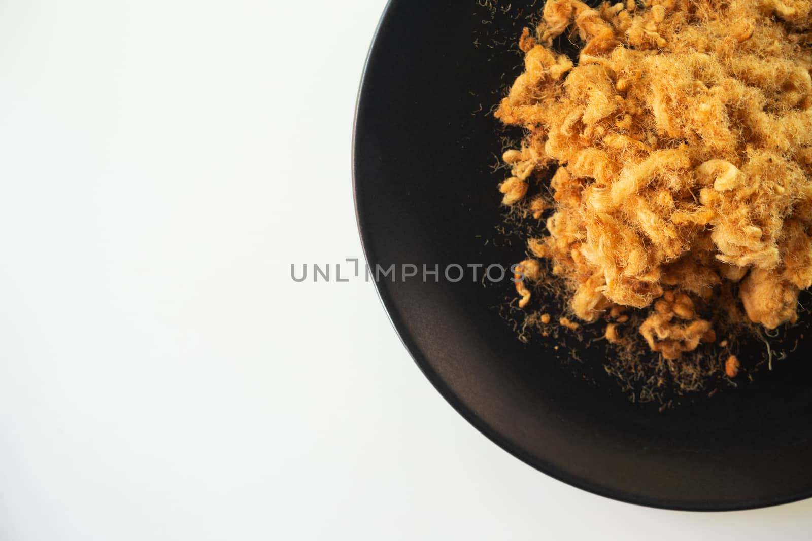 Dried shredded pork on white background, Flossy pork, Top view