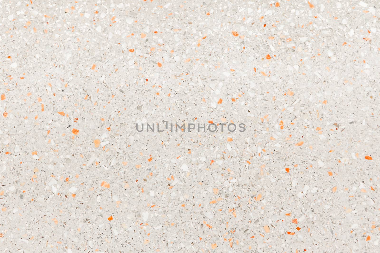 terrazzo flooring which has Orange rock Small or marble old. polished stone wall beautiful texture for background with copy space add text