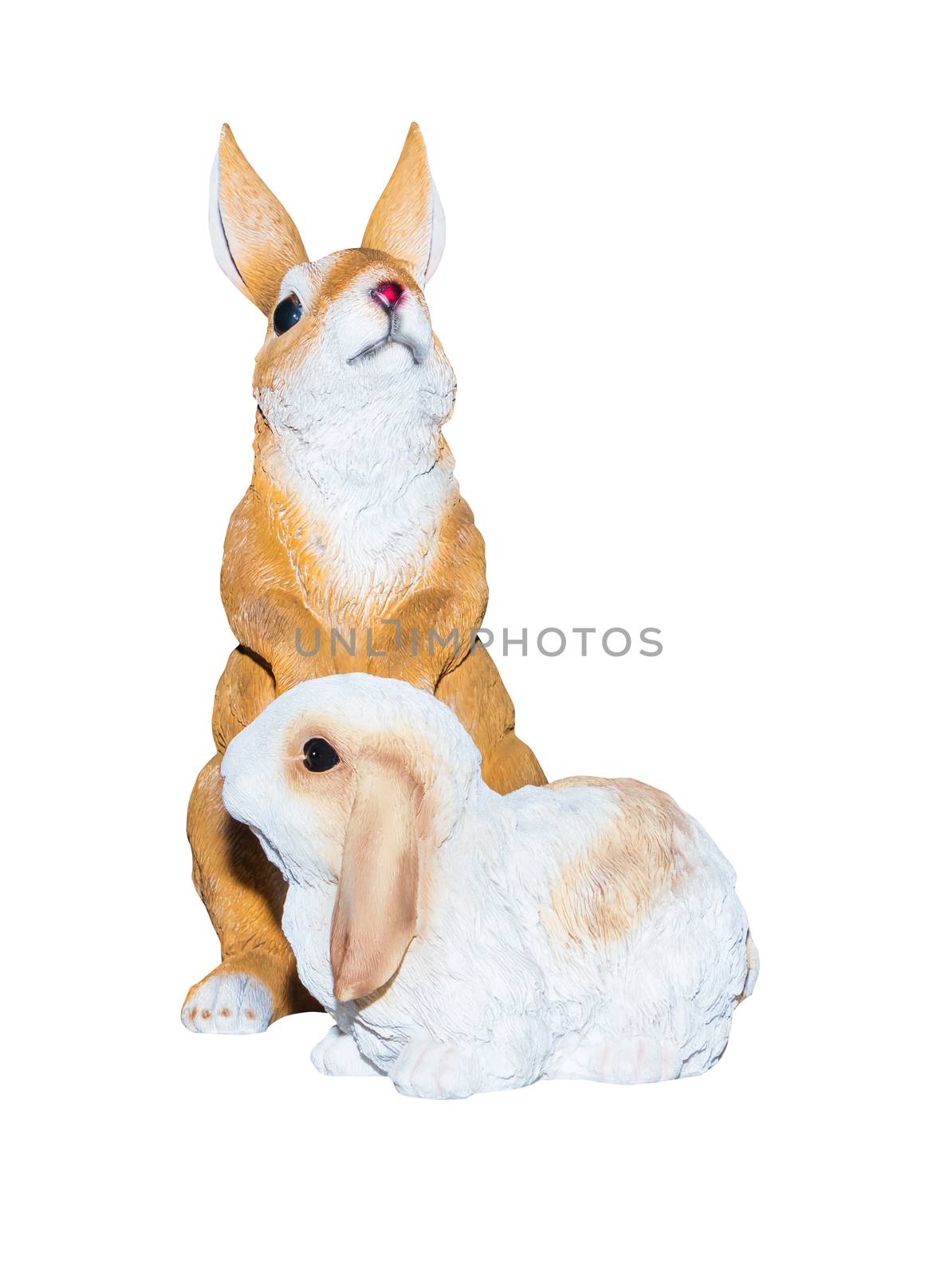 Two rabbits dolly toy is standing isolated on a white background by pramot