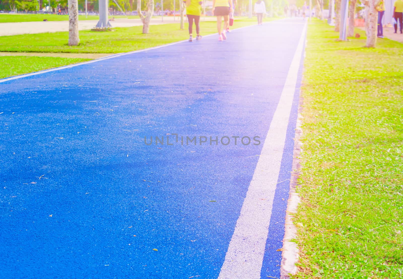 running track in runner rubber cover blue public park by pramot