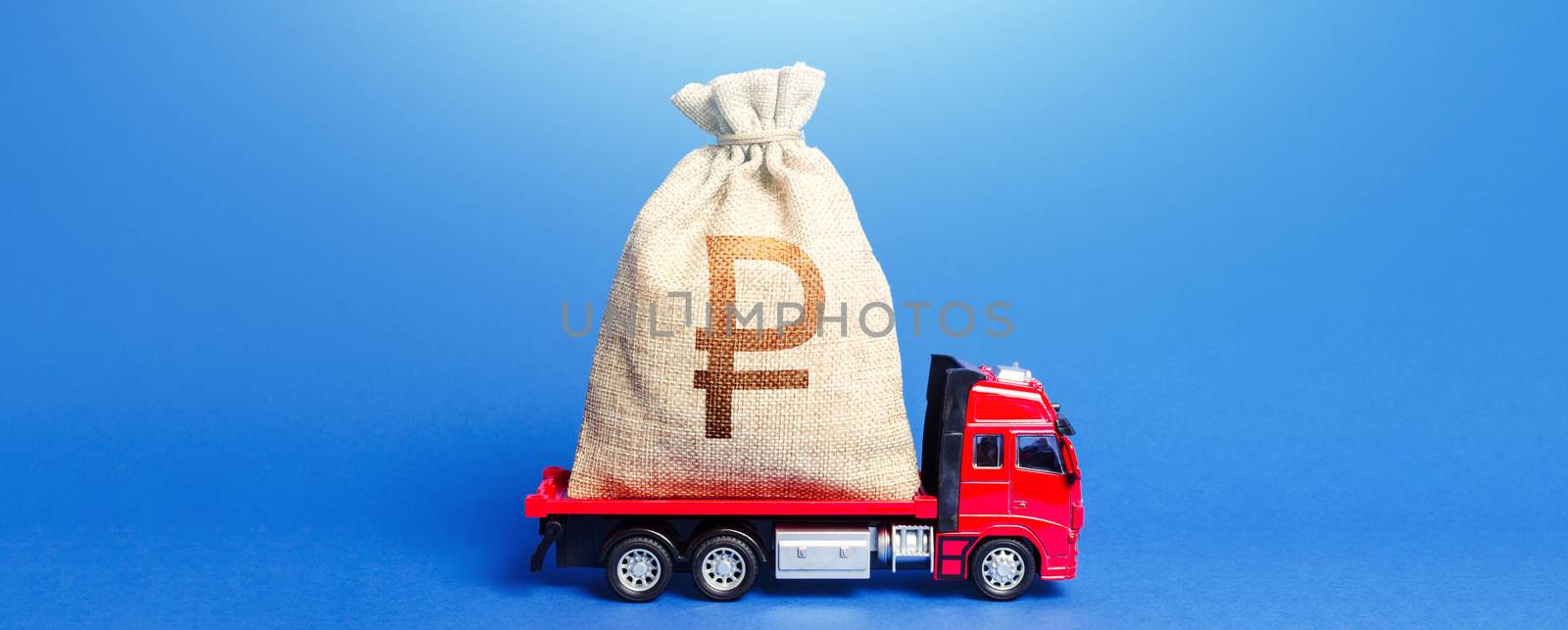 Truck is carrying a huge russian ruble money bag. Anti-crisis measures of government. Great investment. Attracting large funds to the economy for subsidies, support and cheap soft loans for businesses by iLixe48