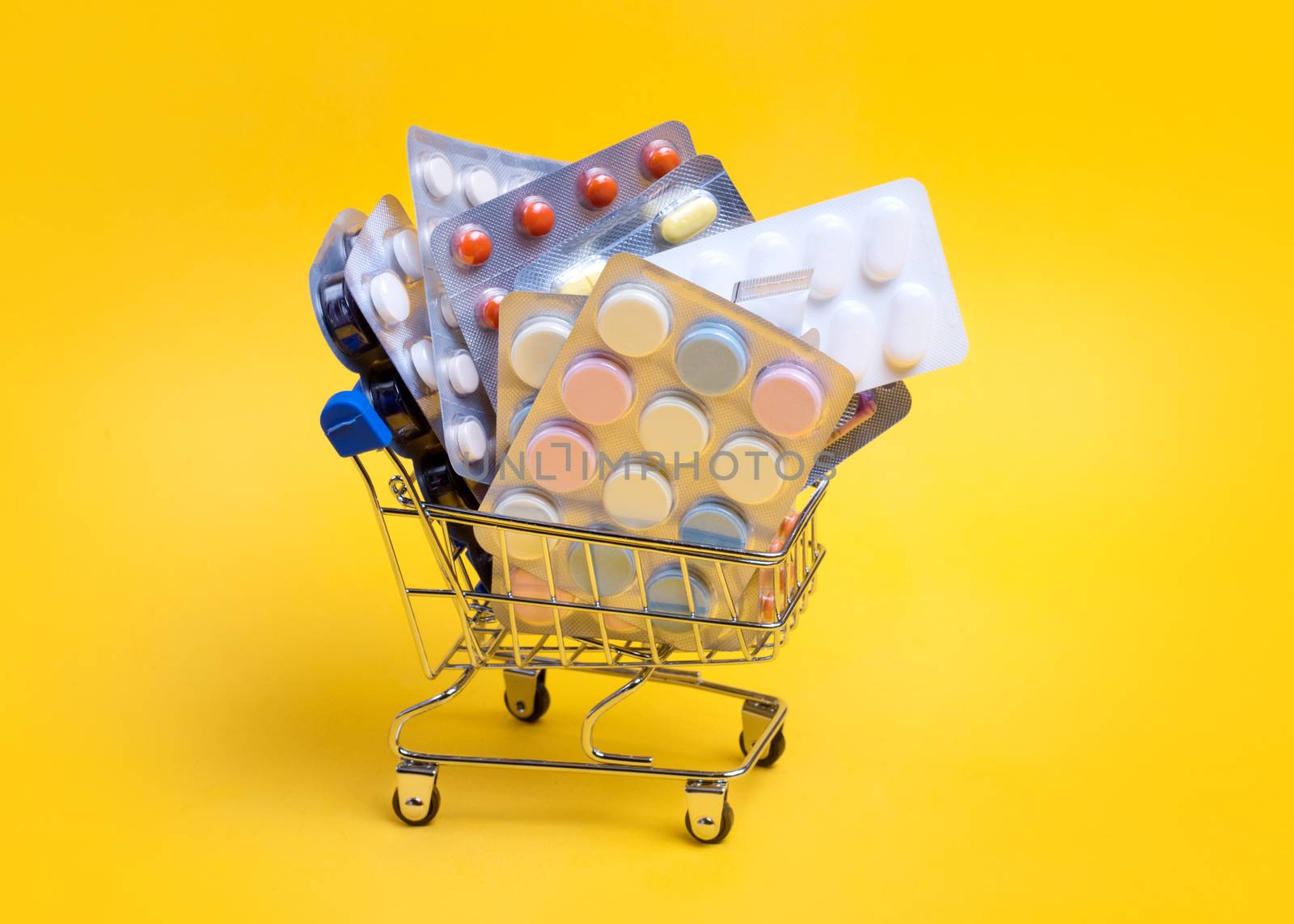 shopping cart with different tablets and pills