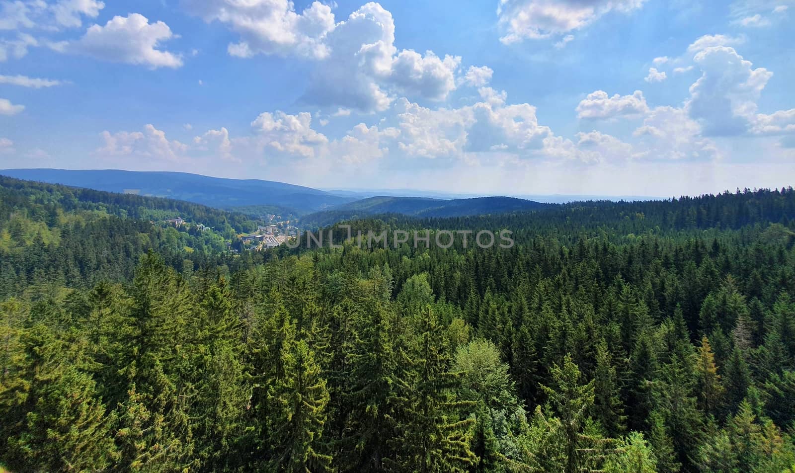 Landscape top view of the nature and forests of the Krkonose mountains (Giant Mountains) with dramatic sky.