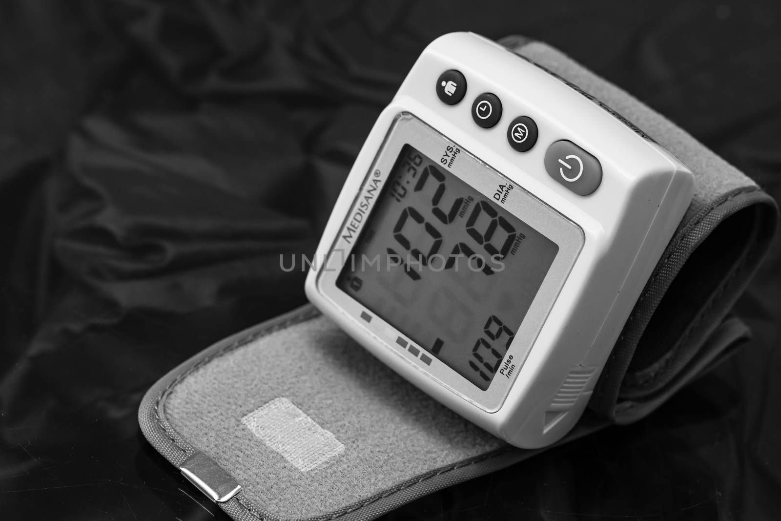 Close up, detail of blood pressure cuff monitor isolated. Digital blood pressure measuring device. Bucharest, Romania, 2020.