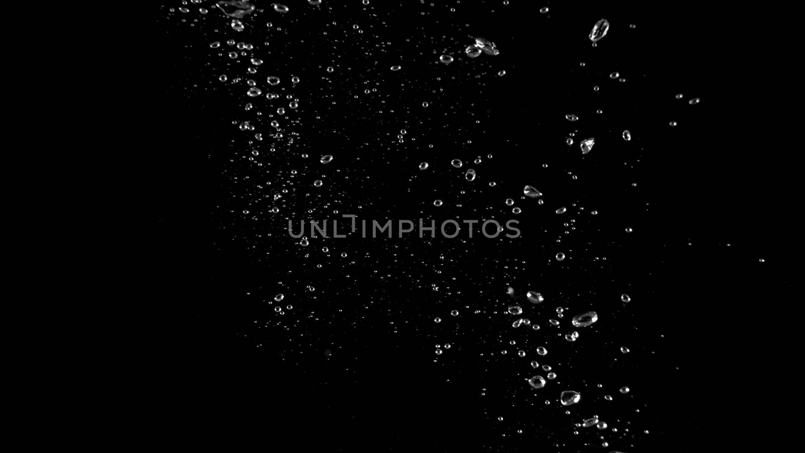 Close-up macro images of soda water bubbles floating up by gnepphoto