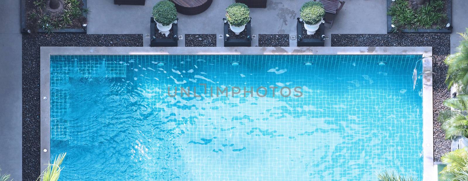 Top view images of swimming pool in summer season by gnepphoto