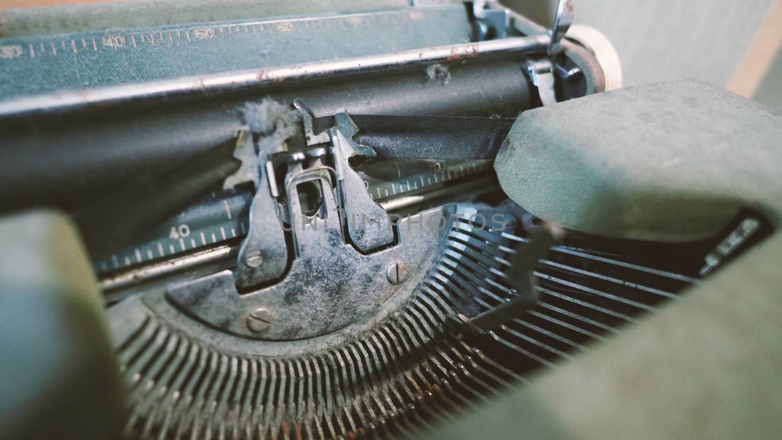 Old typewriter machine in good condition with no paper in feed  by gnepphoto