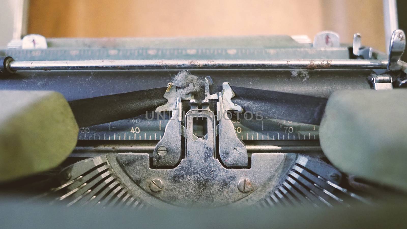 Old typewriter machine in good condition with no paper in feed for use in the past job career such as write office document, copywriter, author, news journalist, secretary, creative and more. 