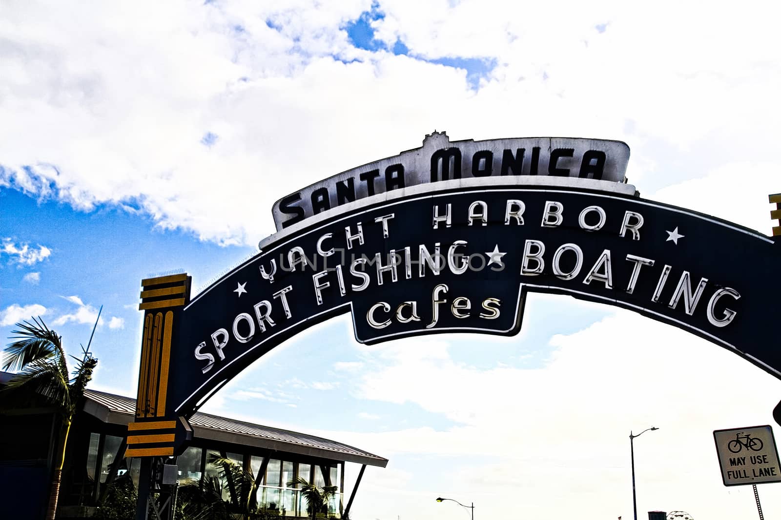 Los Angeles,CA/USA - Oct 29, 2015 : Welcoming arch in Santa Monica, California. The city has 3.5 miles of beach locations.Santa Monica Pier, Picture of the entrance with the famous arch sign.