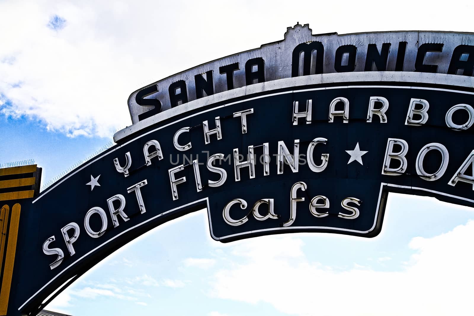 Los Angeles,CA/USA - Oct 29, 2015 : Welcoming arch in Santa Monica, California. The city has 3.5 miles of beach locations.Santa Monica Pier, Picture of the entrance with the famous arch sign.