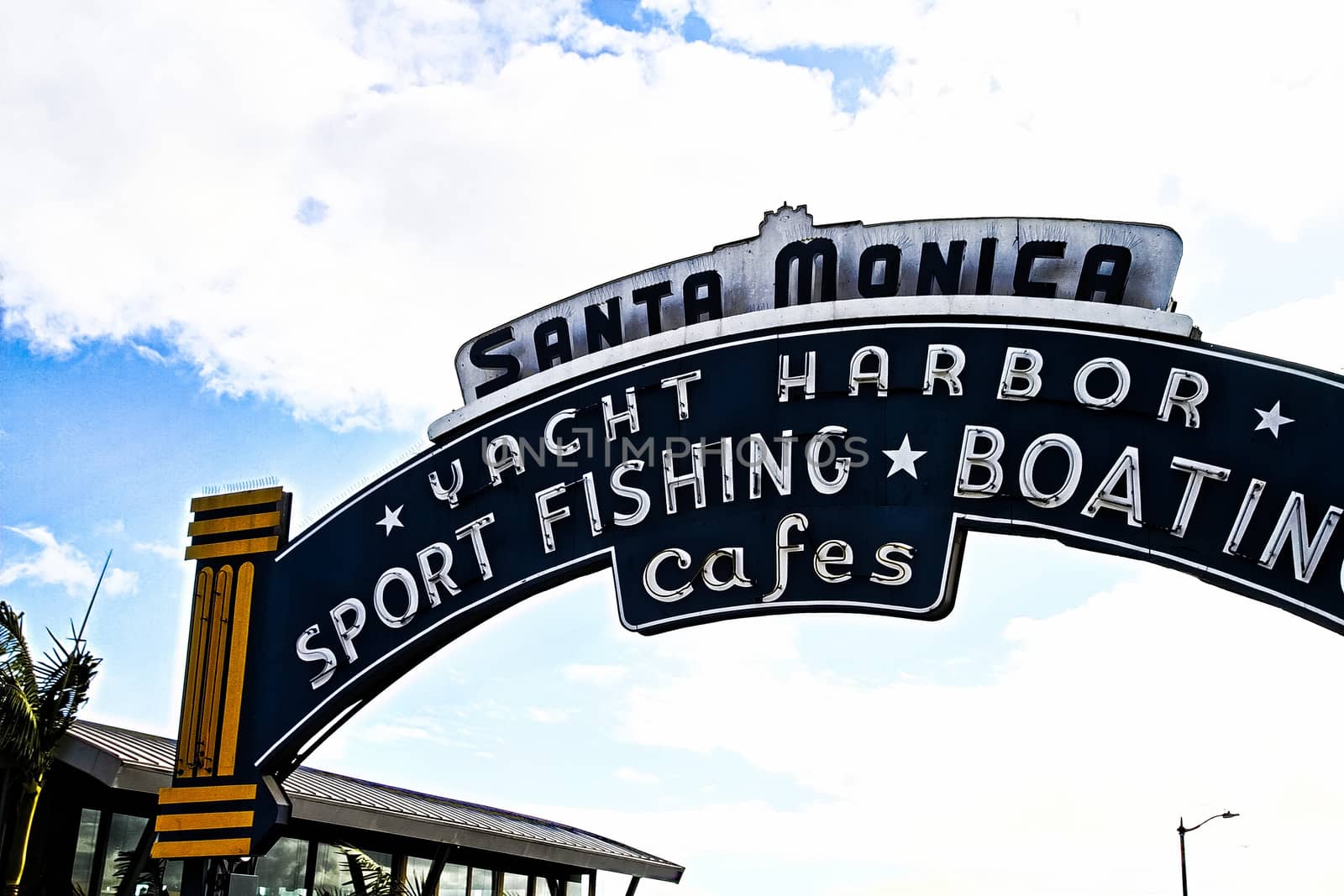 Los Angeles,CA/USA - Oct 29, 2015 : Welcoming arch in Santa Monica, California. The city has 3.5 miles of beach locations.Santa Monica Pier, Picture of the entrance with the famous arch sign.