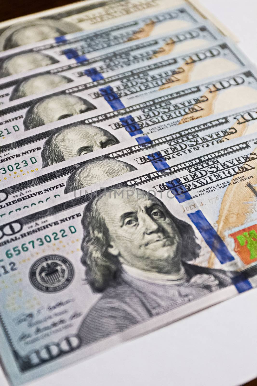 Money American dollar bills,stack of 100 dollar bills close-up,Hundreds of US dollars,dollars cash.Currency US dollar banknotes close-up. Portrait of the President.