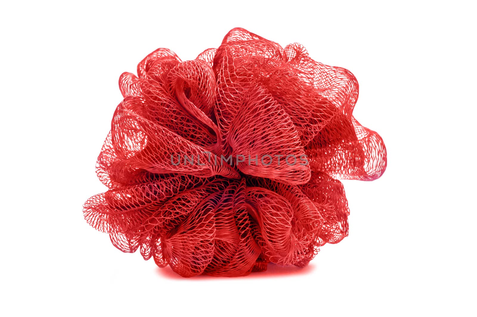 Horizontal shot of a big red bath scrubber on a white background. 
