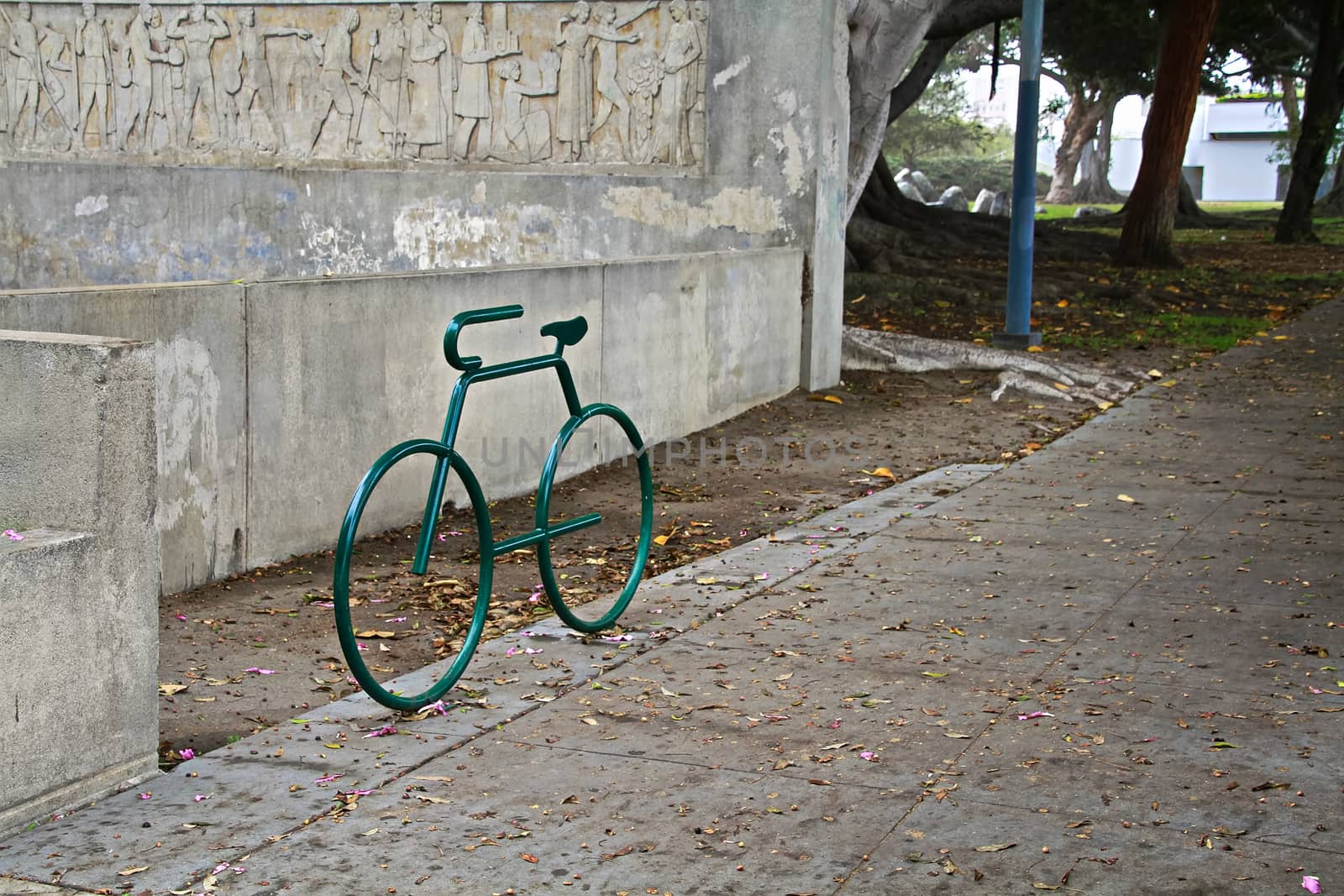 A bike parking opportunity with a symbol.bike parking Bicycle racks in bicycle parking facility Modern bike storage in the form of a steel spiral Bicycle parking. by USA-TARO