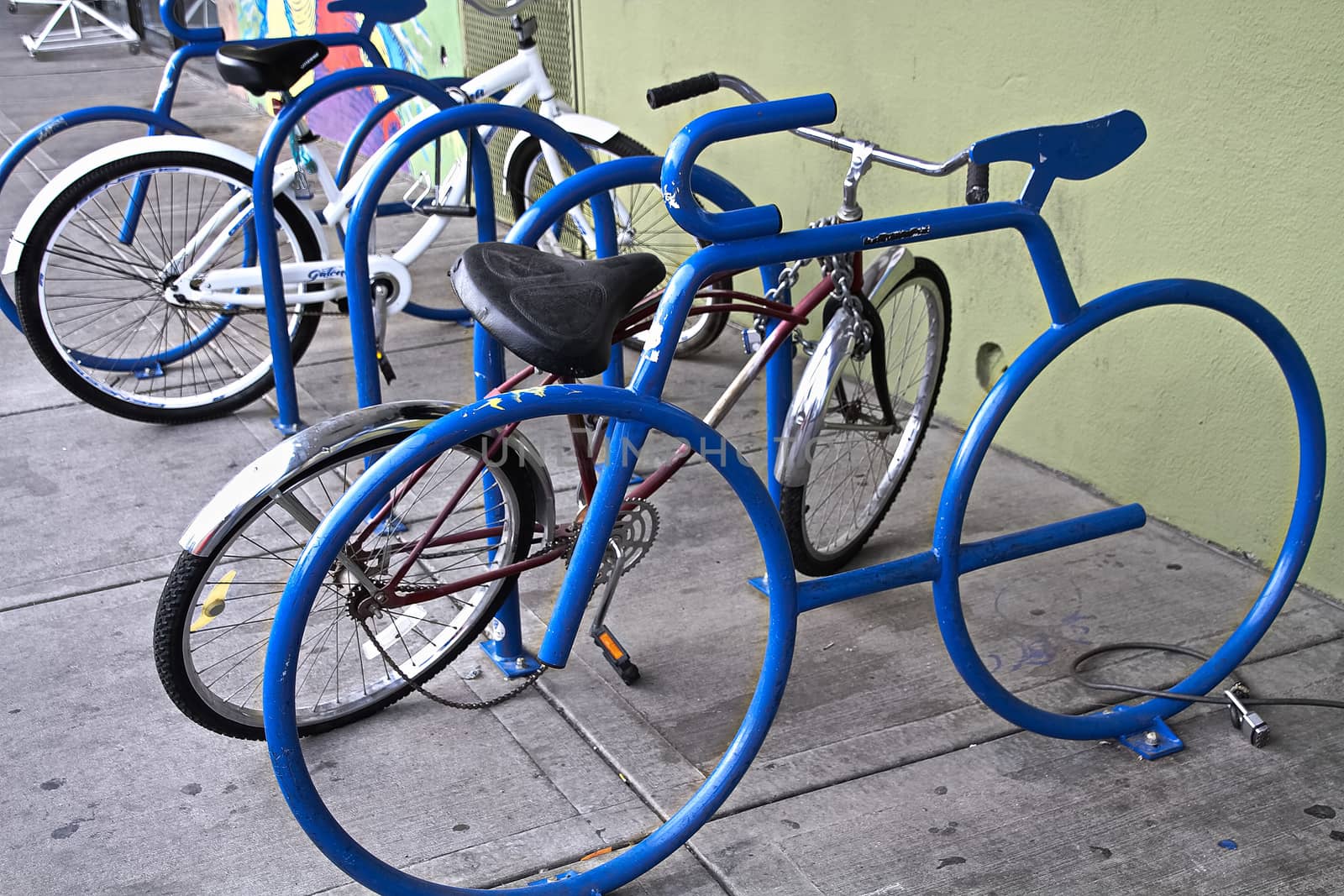 A bike parking opportunity with a symbol.bike parking Bicycle racks in bicycle parking facility Modern bike storage in the form of a steel spiral Bicycle parking.