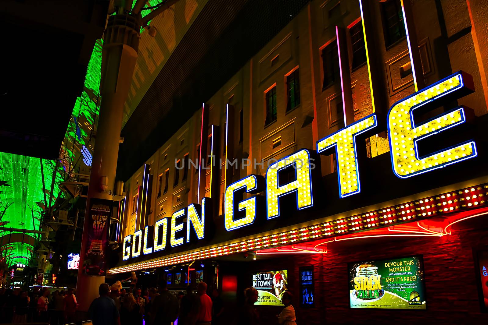 LAS VEGAS,NV - Sep 16, 2018: Golden Gate Hotel & Casino sign illuminated by night in Las Vegas. It is the oldest and smallest hotel located on the Fremont Street Experience. by USA-TARO