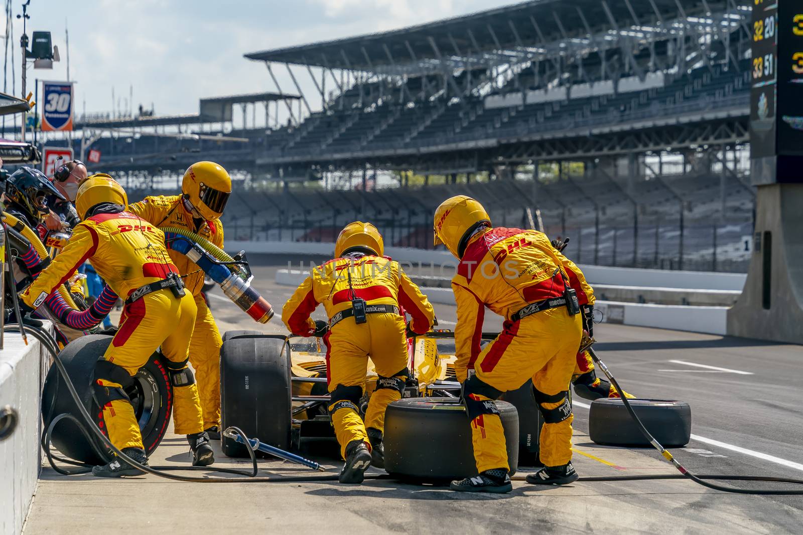 RYAN HUNTER-REAY (28) of the United States brings his car in for service during the Indianapolis 500 at Indianapolis Motor Speedway in Indianapolis Indiana.
