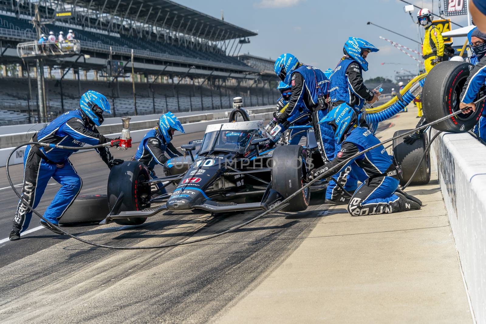 FELIX ROSENQVIST (10) of Varnamo, Sweden brings his car in for service during the Indianapolis 500 at Indianapolis Motor Speedway in Indianapolis Indiana.