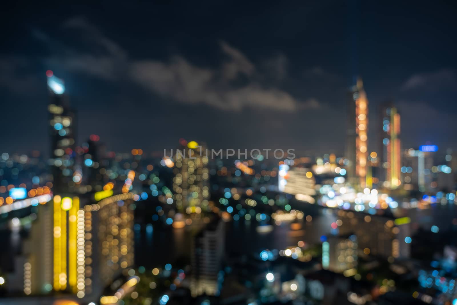 Abstract Photo blurred bokeh of bangkok cityscape river view at twilight time, background concept