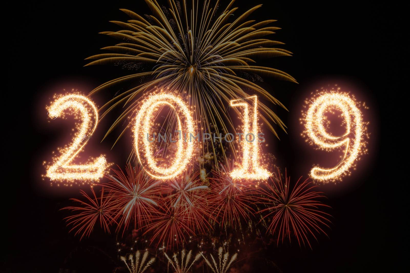 2019 written with Sparkle firework on fireworks with dark backgr by Tzido