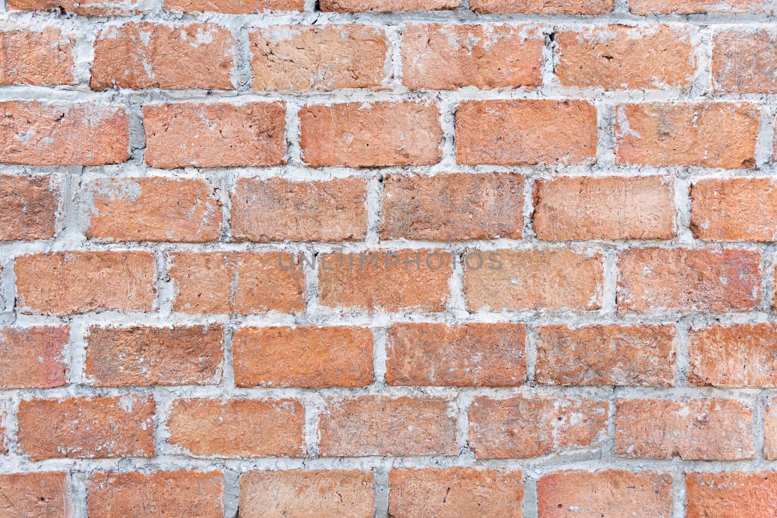 Abstract red brick wall texture light gray old stucco and vintage brickwork pattern background in home interior, grunge rusty blocks of stonework grey color panoramic wide wallpaper