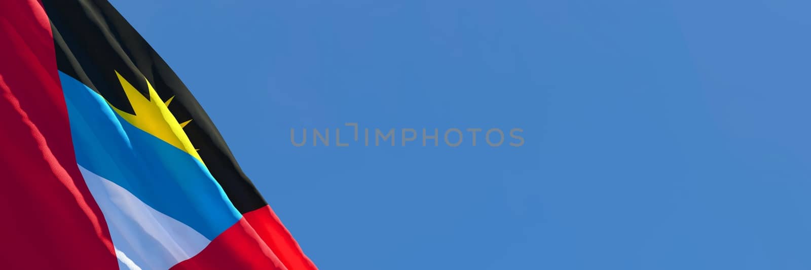 3D rendering of the national flag of Barbuda waving in the wind against a blue sky