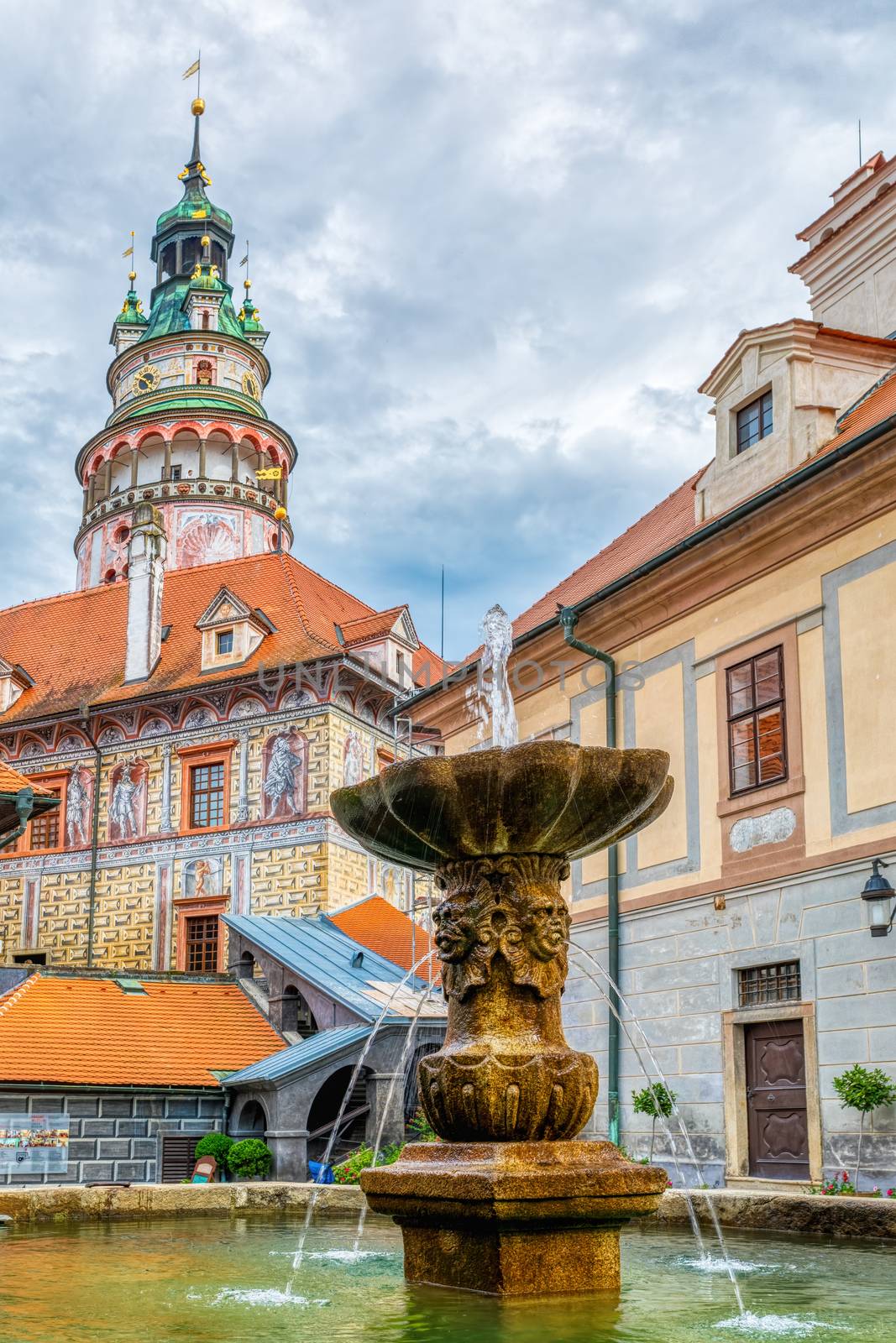 Romantic View of the Castle Tower and Fountain in the Courtyard in Cesky Krumlov