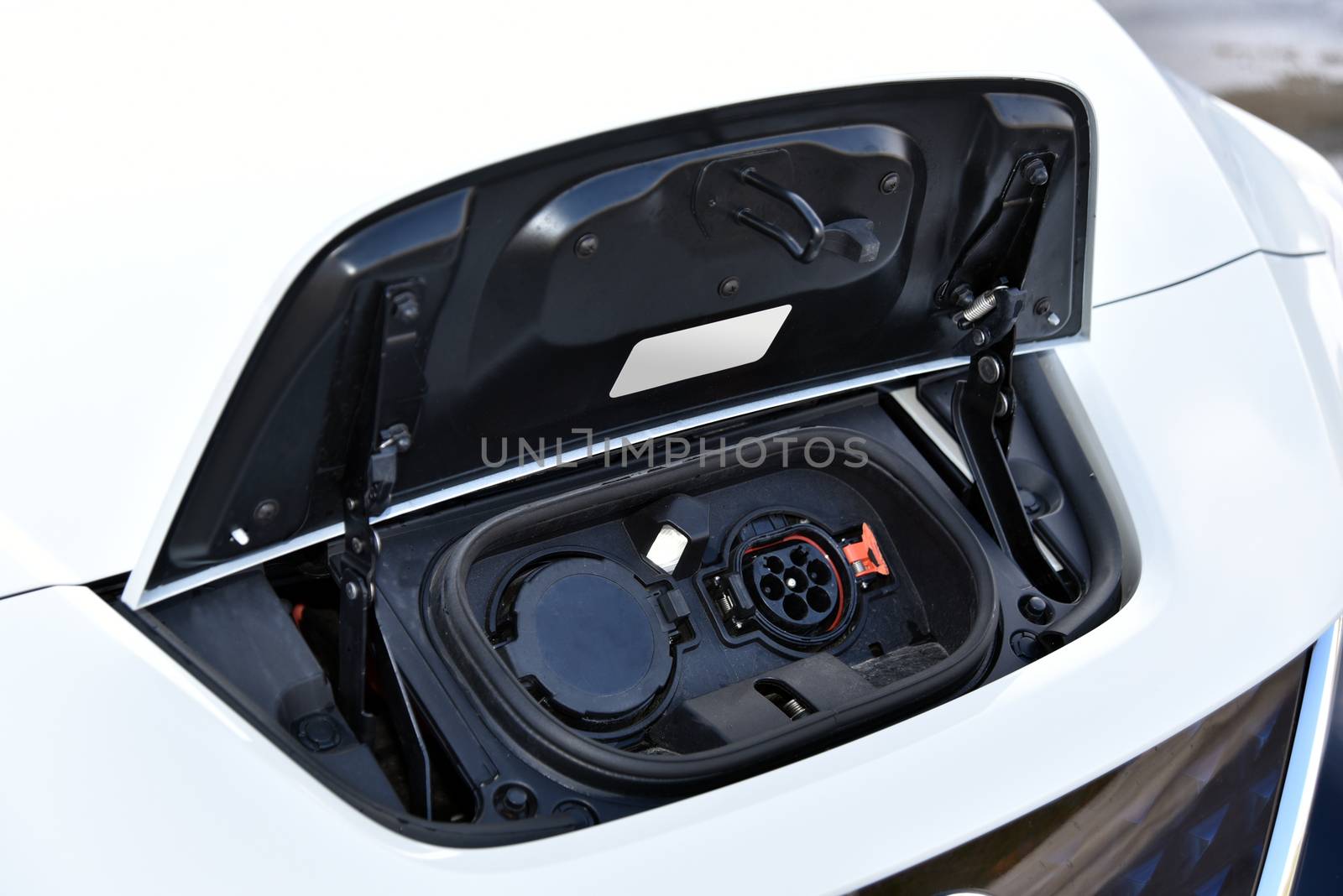 Charging port on a modern electric car by aselsa