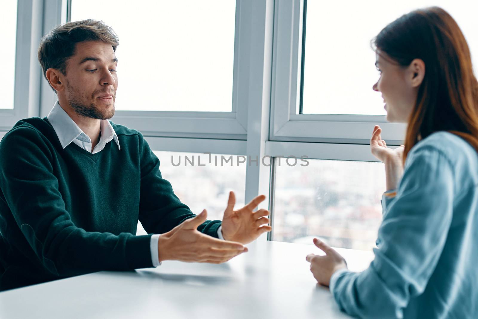 Man and woman at the table dating communication joy friendship by SHOTPRIME