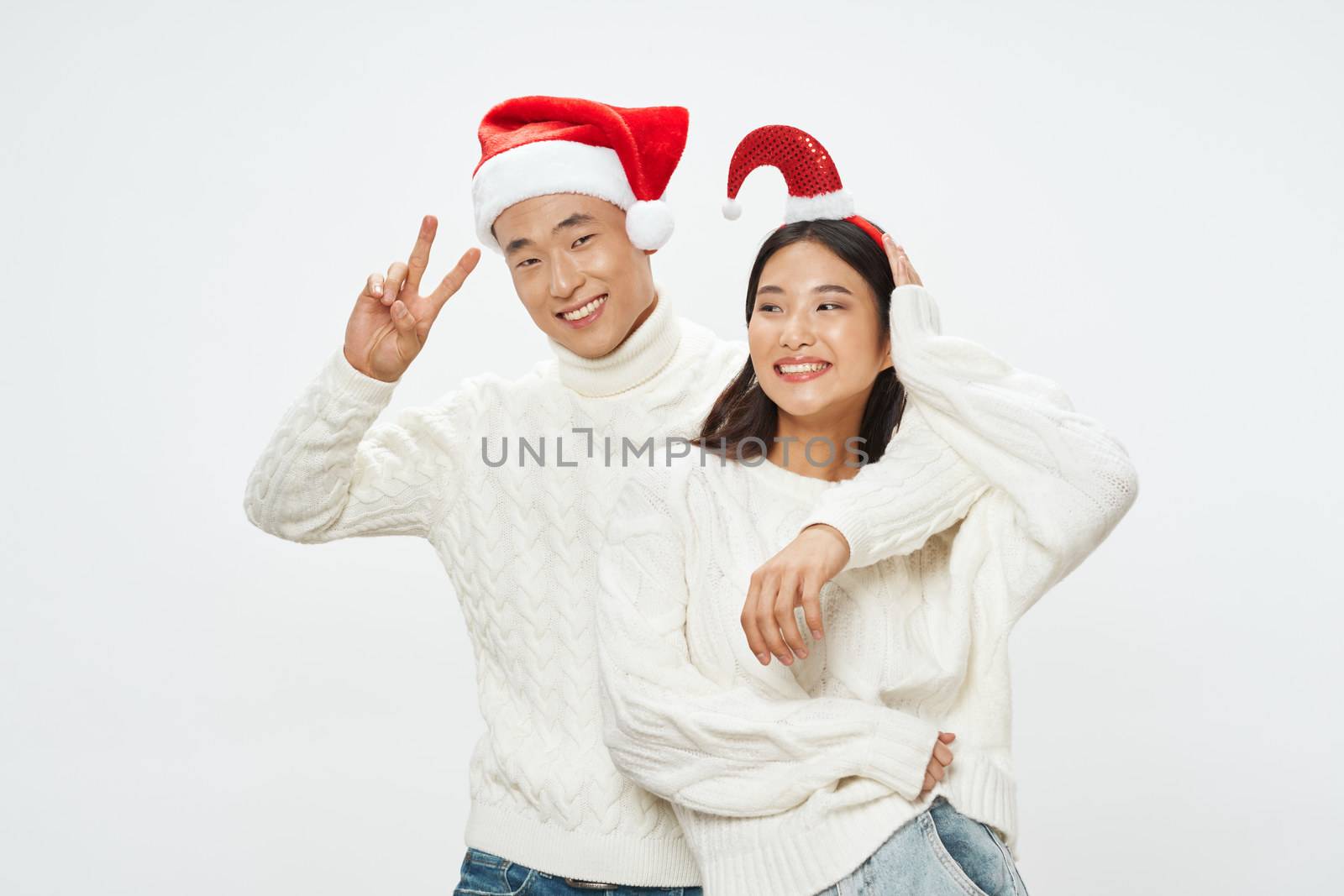Merry time in white sweaters Christmas holiday family hug romance
