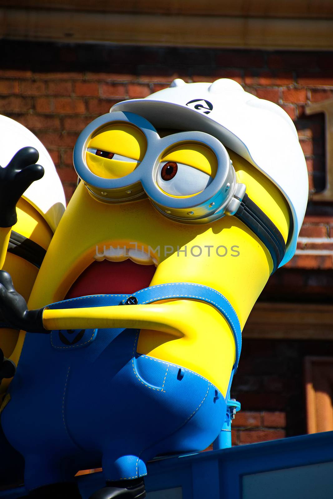 OSAKA, JAPAN - Feb 19, 2020 : Statue of "HAPPY MINION", located in Universal Studios Japan, Osaka, Japan. Minions are famous character from Despicable Me animation.