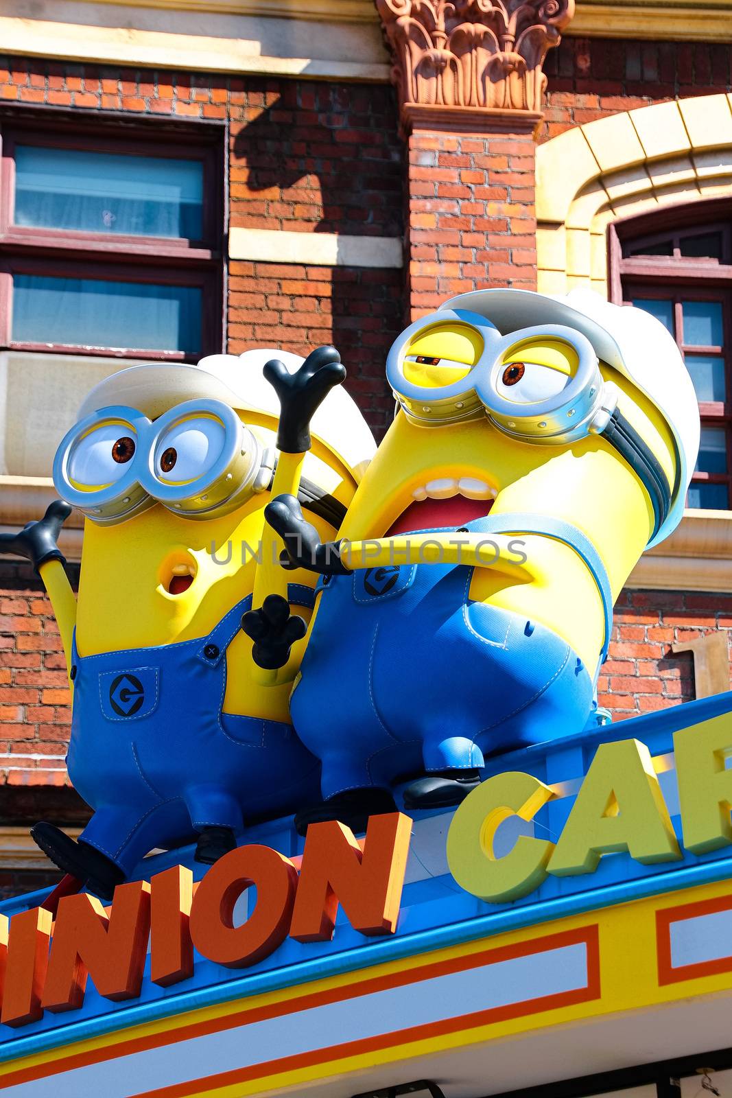 OSAKA, JAPAN - Feb 19, 2020 : Statue of "HAPPY MINION", located in Universal Studios Japan, Osaka, Japan. Minions are famous character from Despicable Me animation. by USA-TARO