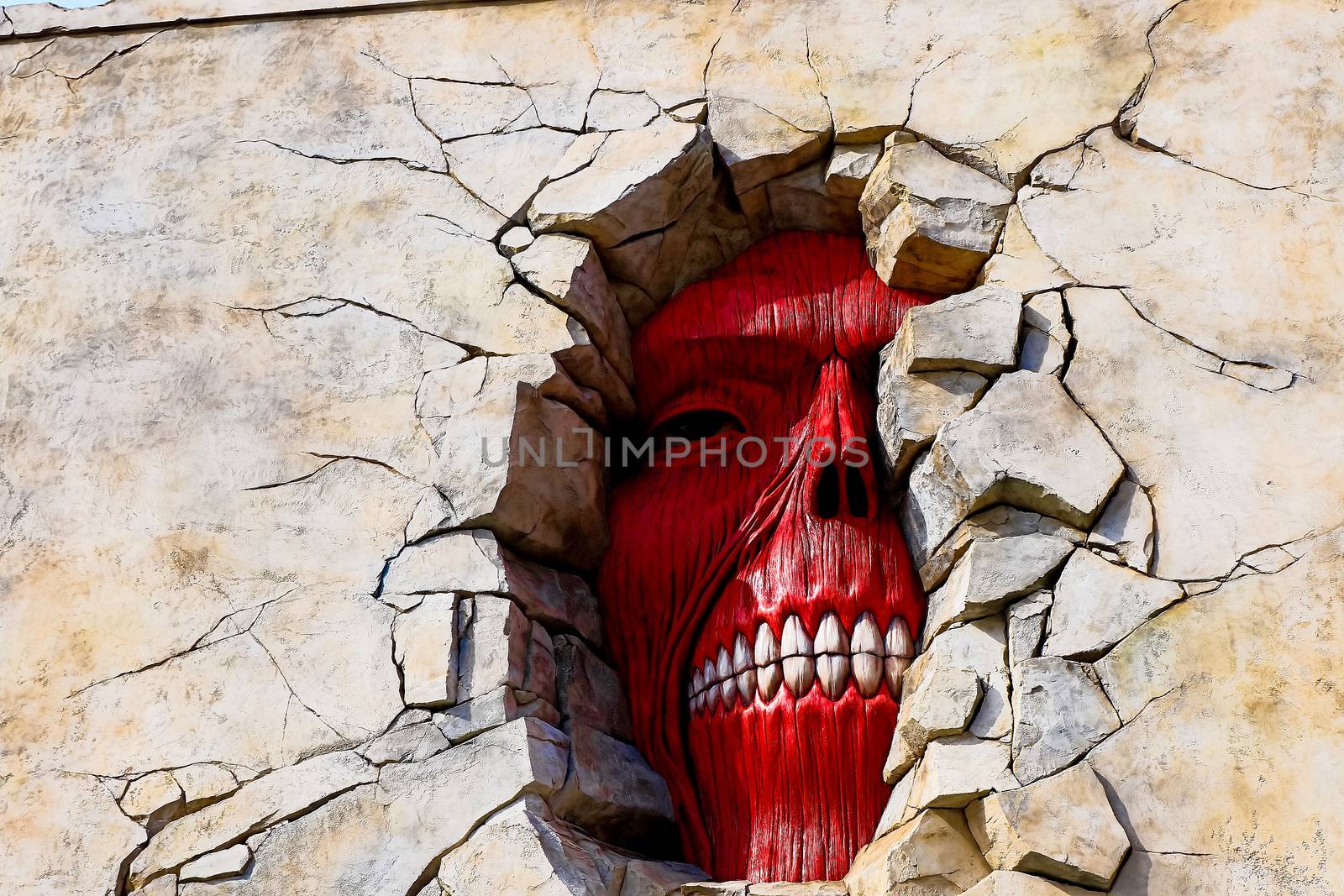 Osaka, Japan - Feb 6 2015 : Life size scale Statue of Wall giant from Attack on Titan (Shingeki no Kyojin) at Universal Studios Japan. by USA-TARO