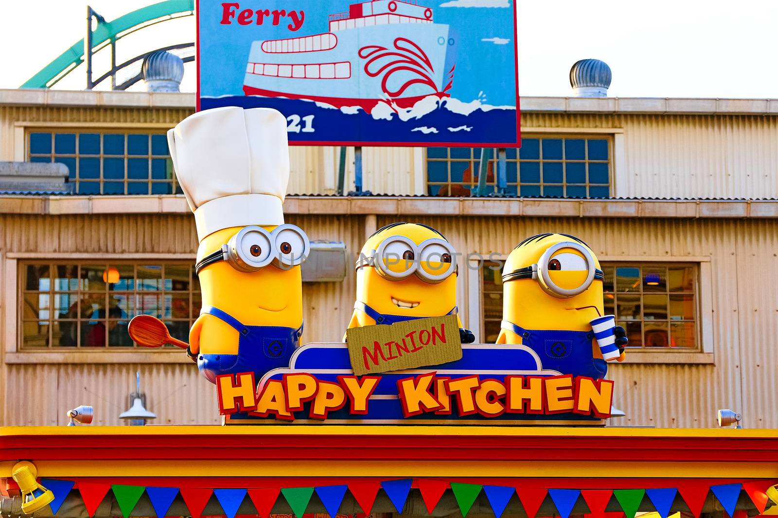 OSAKA, JAPAN - Nov 13, 2019 : Close up HAPPY MINION statue in Universal Studios Japan. Minions are famous character from Despicable Me animation.