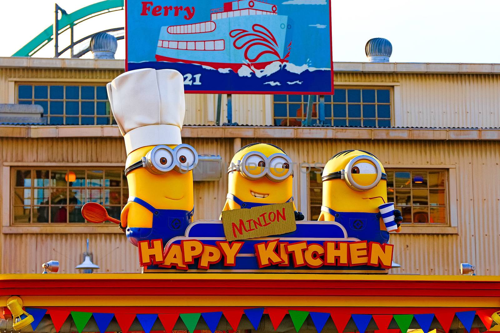 OSAKA, JAPAN - Nov 13, 2019 : Close up HAPPY MINION statue in Universal Studios Japan. Minions are famous character from Despicable Me animation.