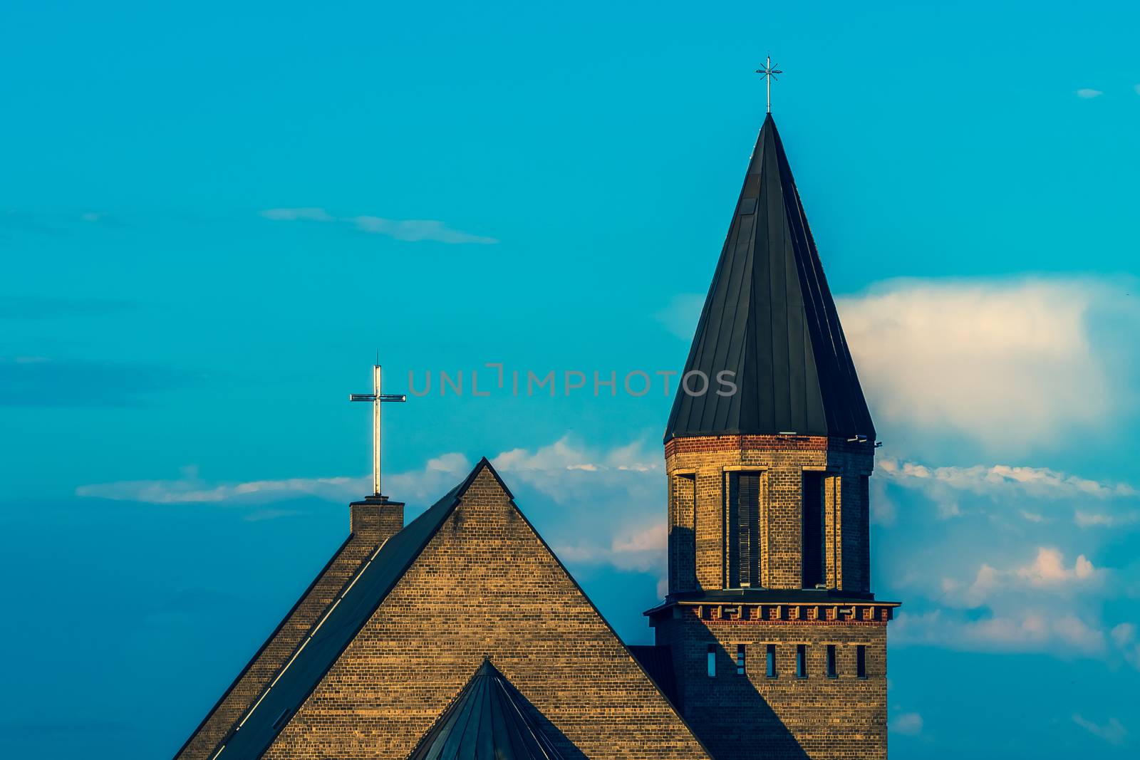 St. Lady of Maria Christian Church Roof with Sunset Clouds View - Alytus Church